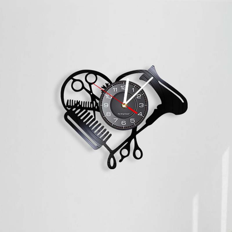 Kreative Wanduhr in Friseurwerkzeug-Silhouette